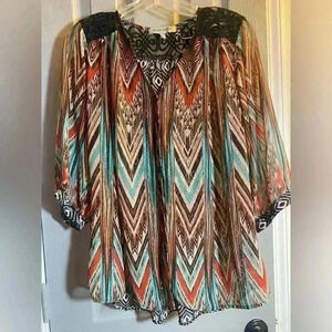 Figueroa & Flower top with Boho look colors are teal brown tan cream & rust Lg.
